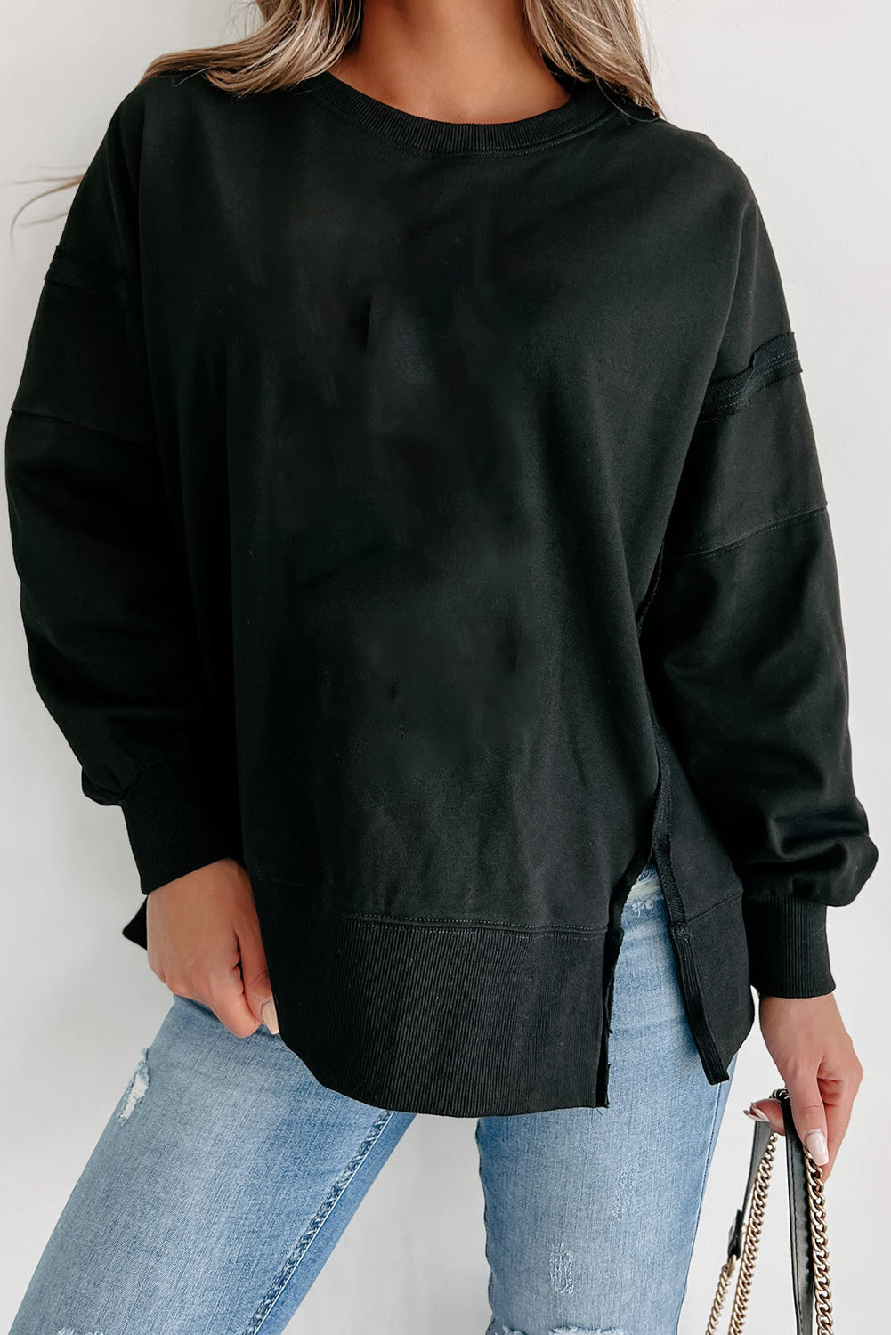 Carrot Exposed Seam Drop Shoulder Side Slit Sweatshirt