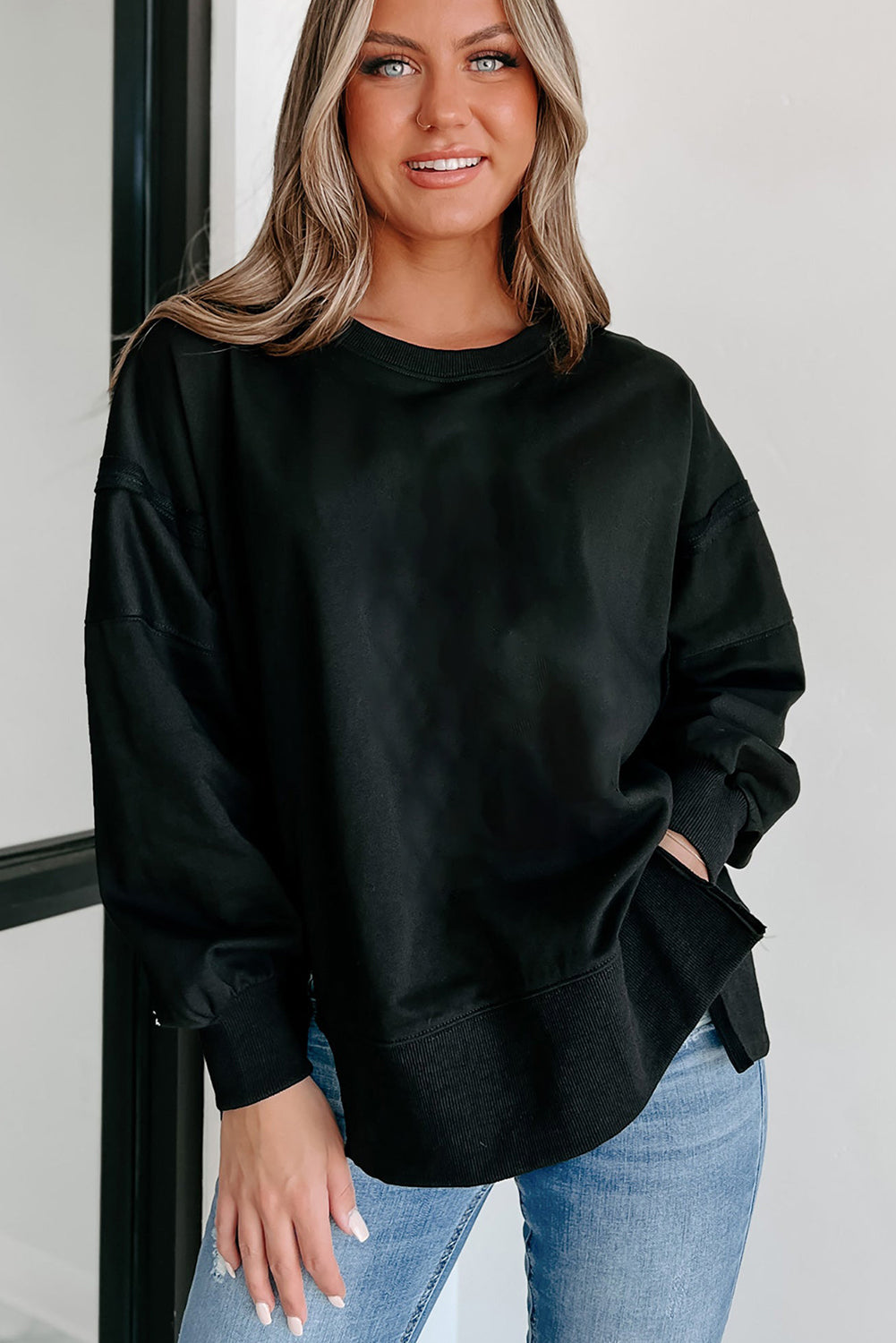 Carrot Exposed Seam Drop Shoulder Side Slit Sweatshirt