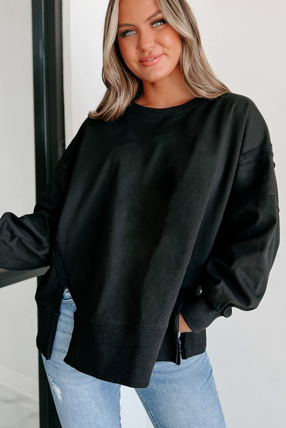 Carrot Exposed Seam Drop Shoulder Side Slit Sweatshirt