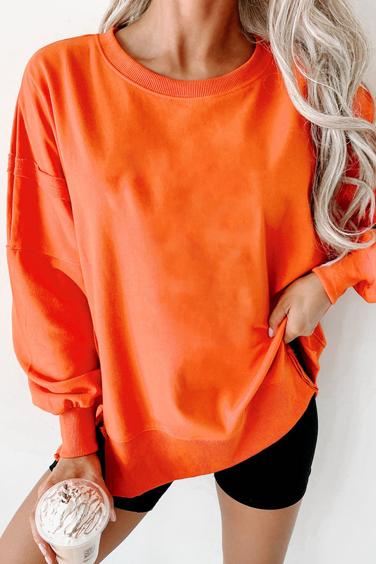 Carrot Exposed Seam Drop Shoulder Side Slit Sweatshirt