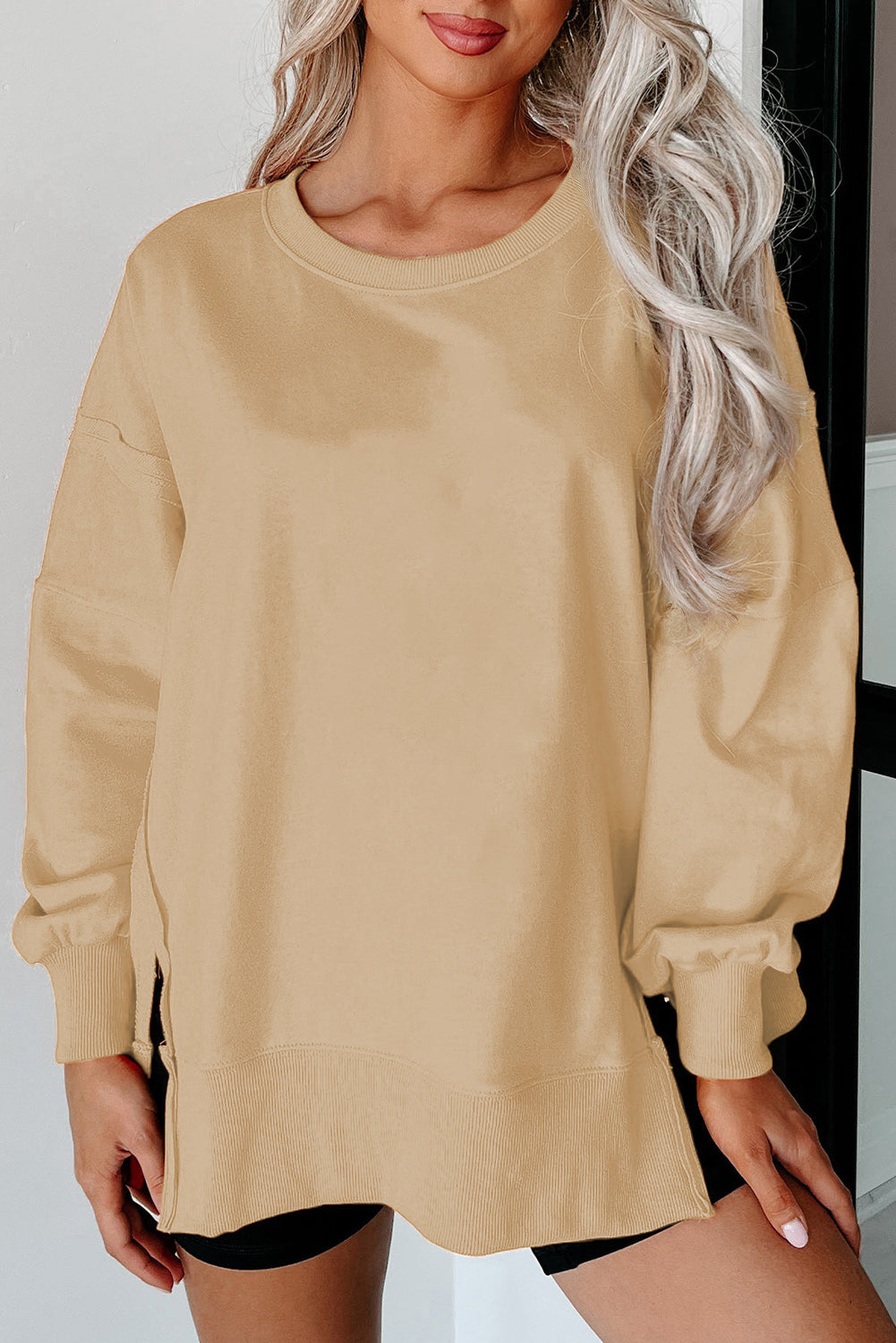 Carrot Exposed Seam Drop Shoulder Side Slit Sweatshirt