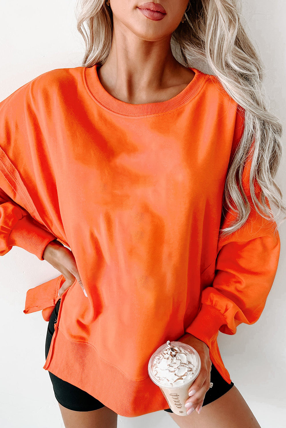 Carrot Exposed Seam Drop Shoulder Side Slit Sweatshirt