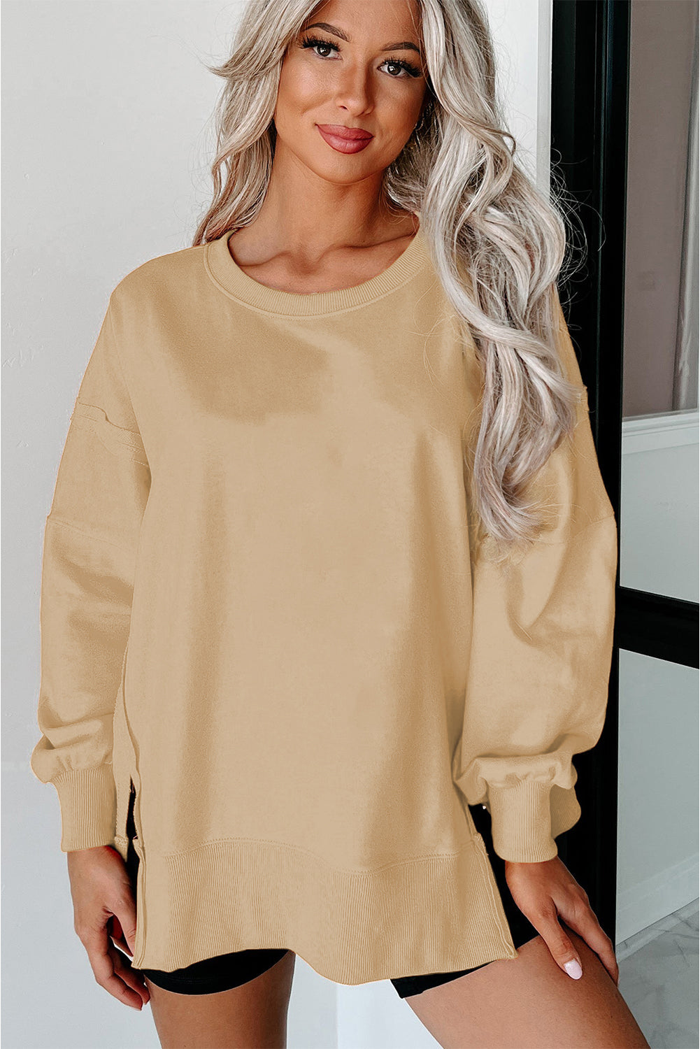 Carrot Exposed Seam Drop Shoulder Side Slit Sweatshirt